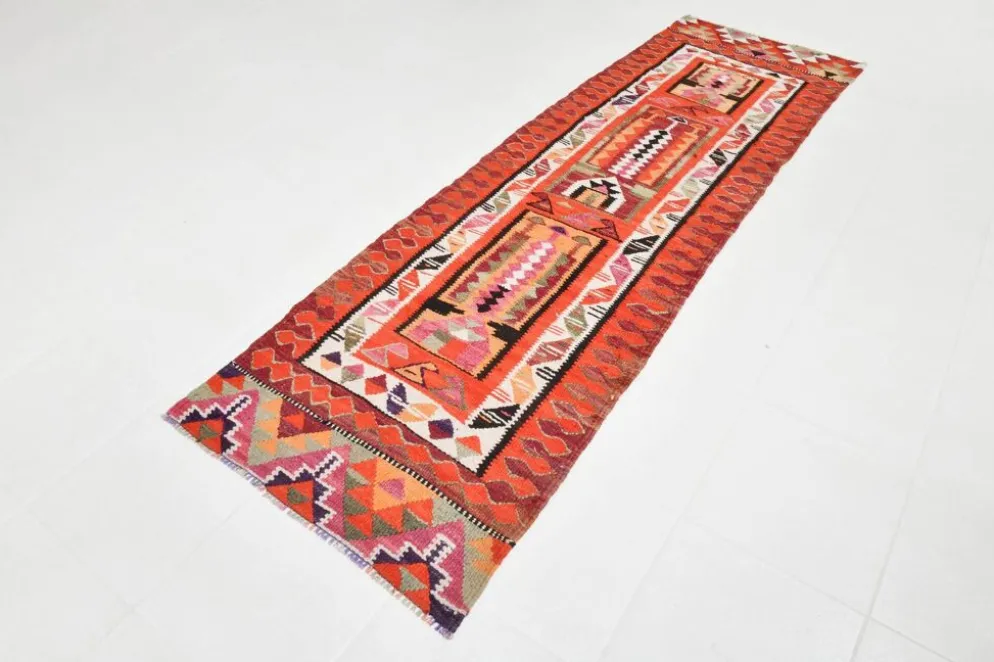 Tapis de couloir tribal kilim géométrique orange et rose