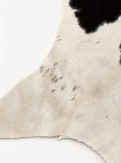 Tapis en peau de vache véritable noir et blanc