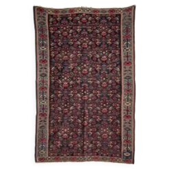 Tapis iranien à motifs floraux stylisés roses et bleus 155x105