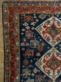Tapis nomade persan Qashqai ancien fait main – fond bleu 94x112cm