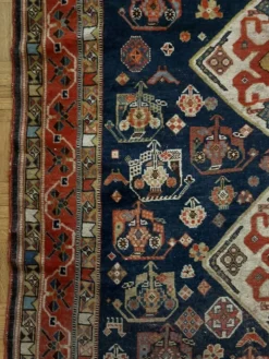 Tapis nomade persan Qashqai ancien fait main – fond bleu 94x112cm
