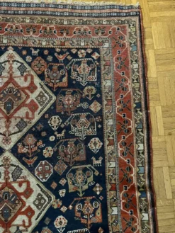 Tapis nomade persan Qashqai ancien fait main – fond bleu 94x112cm