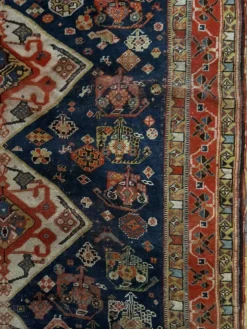 Tapis nomade persan Qashqai ancien fait main – fond bleu 94x112cm