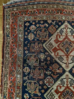 Tapis nomade persan Qashqai ancien fait main – fond bleu 94x112cm