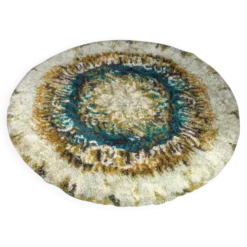 Tapis Rya en laine beige, marron et turquoise.