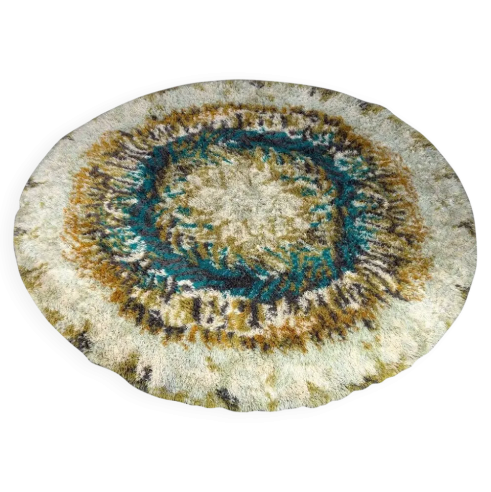 Tapis Rya en laine beige, marron et turquoise.