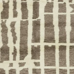 Tapis Tulu contemporain fait à la main en laine naturelle marron et beige.