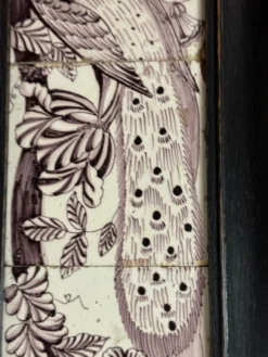 Trois carreaux de Delft manganèse formant un portrait de paon, XVIIIème siècle