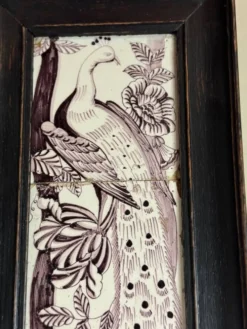 Trois carreaux de Delft manganèse formant un portrait de paon, XVIIIème siècle