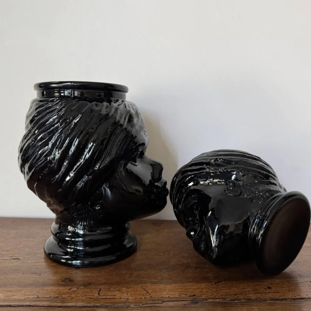 2 têtes en verre représentant des Maures