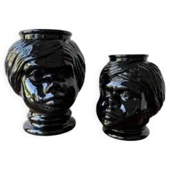 2 têtes en verre représentant des Maures