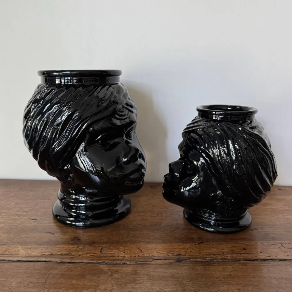 2 têtes en verre représentant des Maures