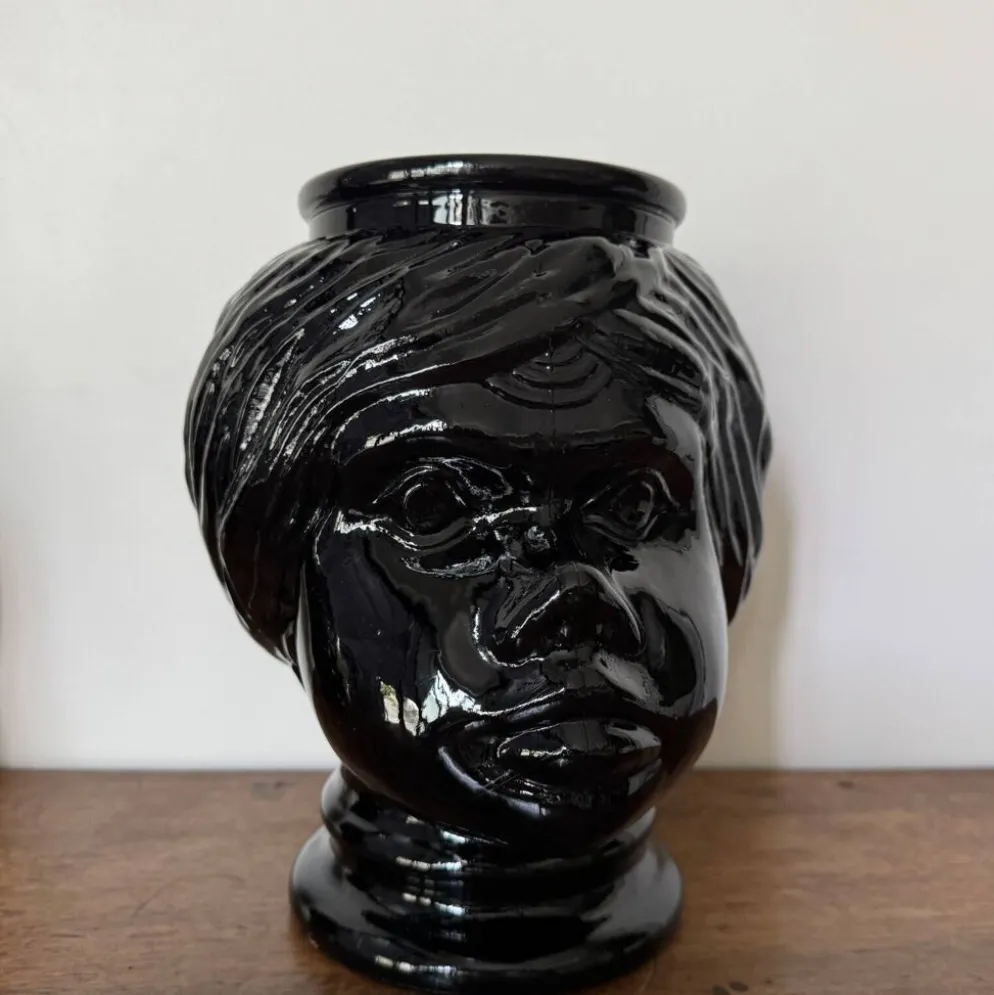 2 têtes en verre représentant des Maures