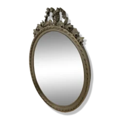 Vintage wooden mirror with arch and flowers