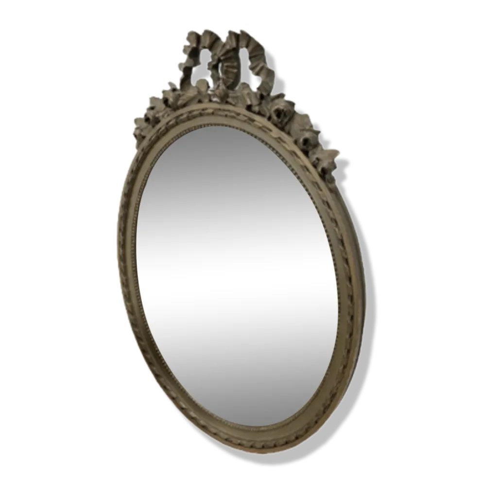 Vintage wooden mirror with arch and flowers